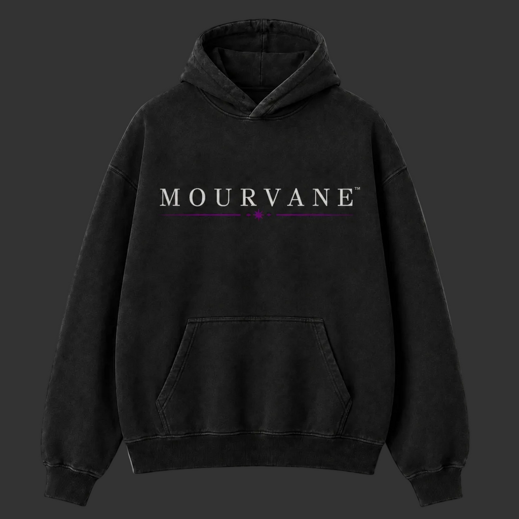 A black washed pullover hoodie with 'MOURVANE' printed in white across the chest, featuring a small purple accent line and heart below the text, shown against a light gray background.